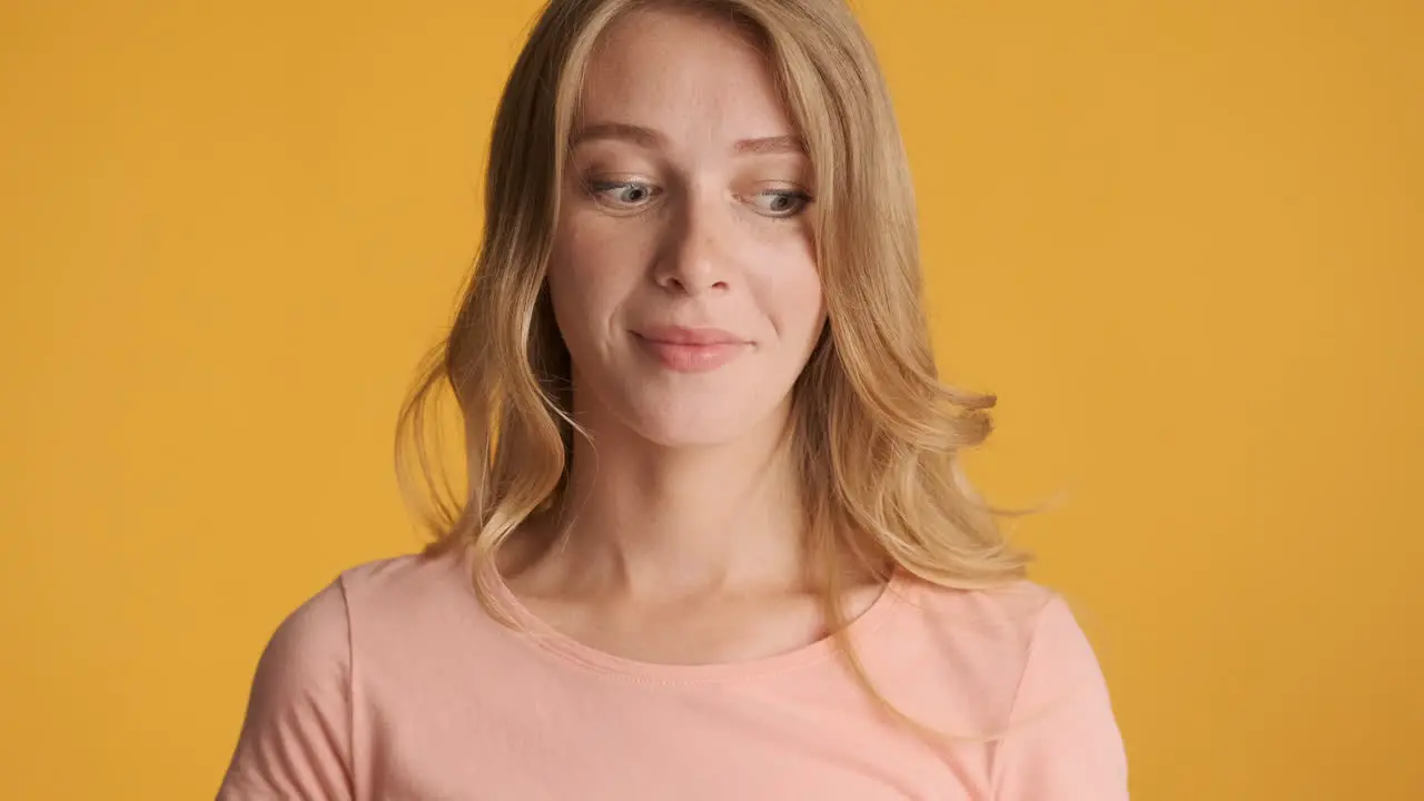 Caucasian woman looking around on camera