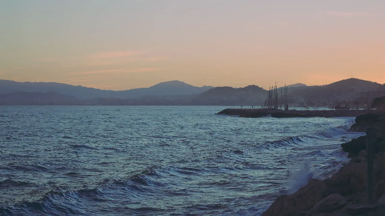 Relaxing sunset at the shoreline of Málaga south of Spain