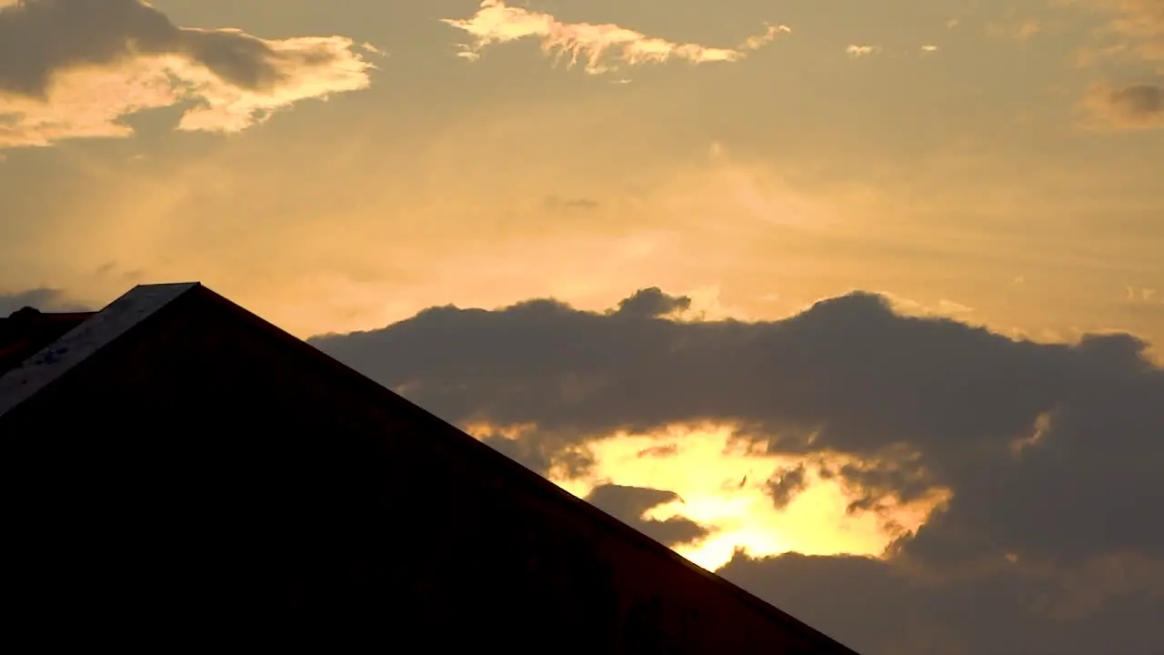 Sunset Time Lapse with moving clouds over the sun