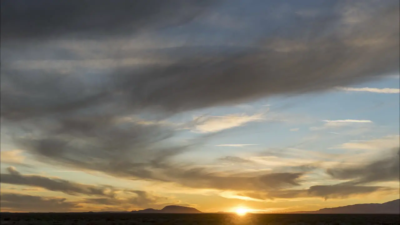 Wide panoramic time lapse view of sunset in Mojave Desert California