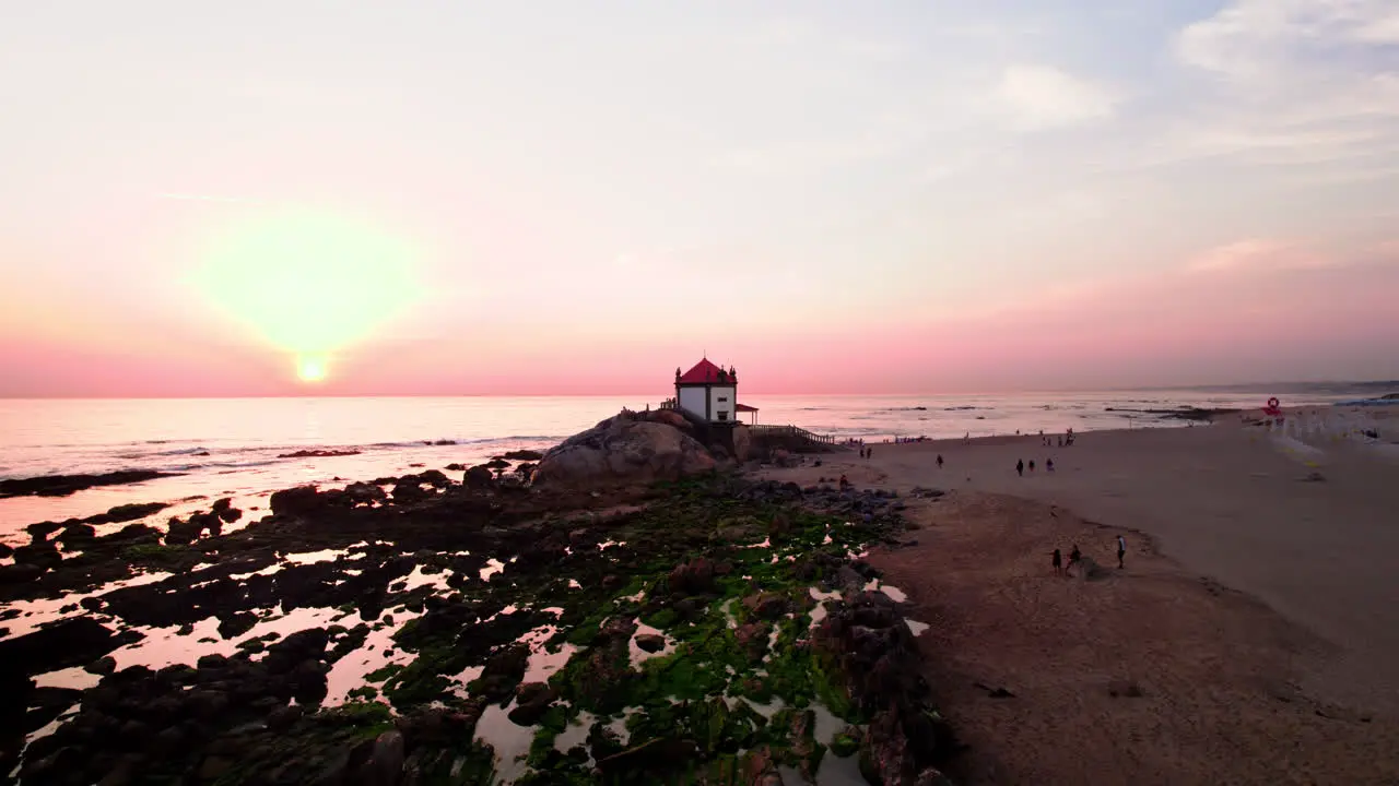 Aerial view of a small temple on the shore of the Atlantic Ocean in the North of Portugal