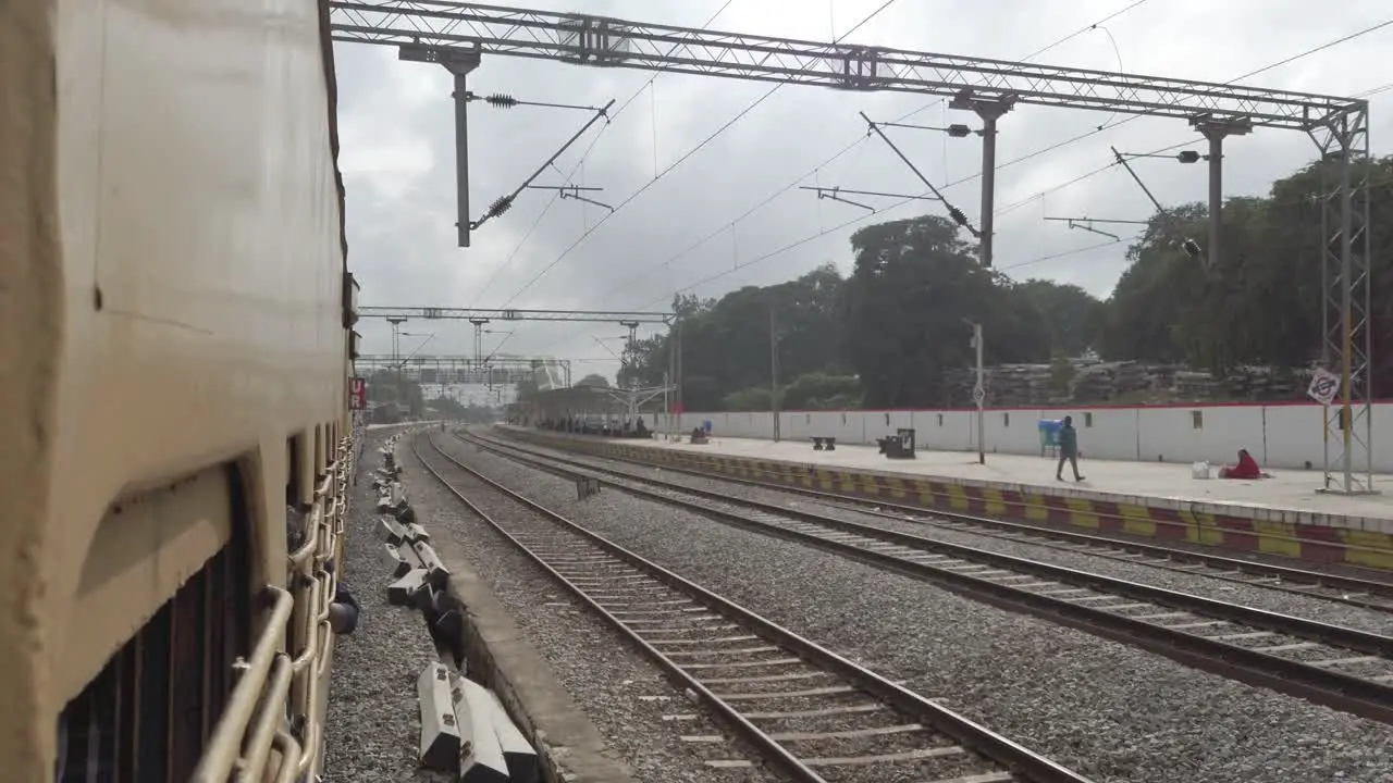 Vaniyambadi Tamilnadu India December 14 2019 View from the window of a interstate train entering a railway station on an overcast day