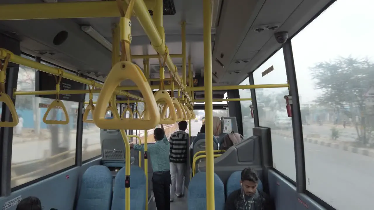 Bengaluru Wide angle shot of the inside of a public bus during day time less crowded due to corona virus fear