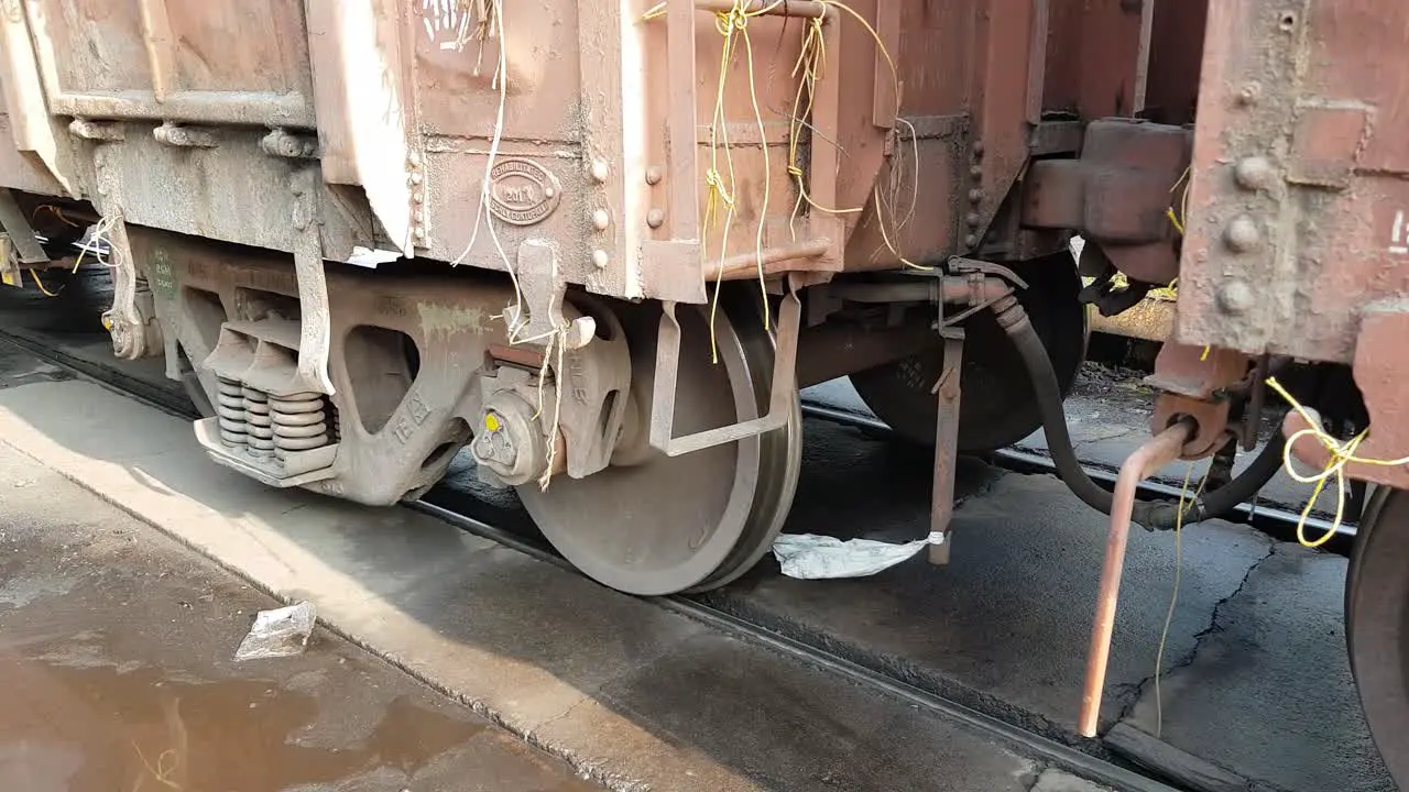 Closeup view of the wheels of a goods train