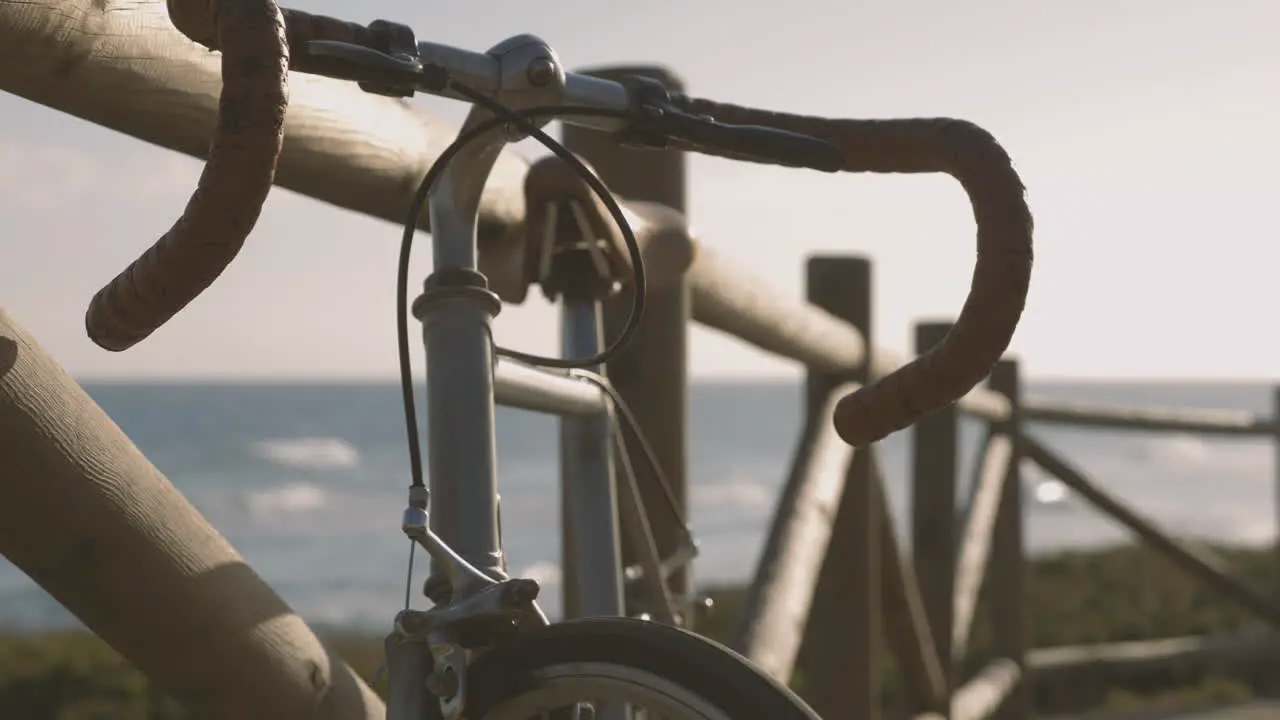 Bicycle Parked On The Boardwalk Near The Beach 1