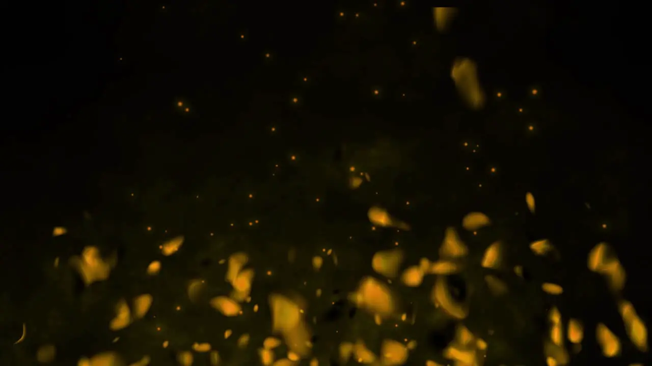 Realistic fire gas with hot fiery embers sparks flames 3D animation particle glow burning on black background vfx yellow