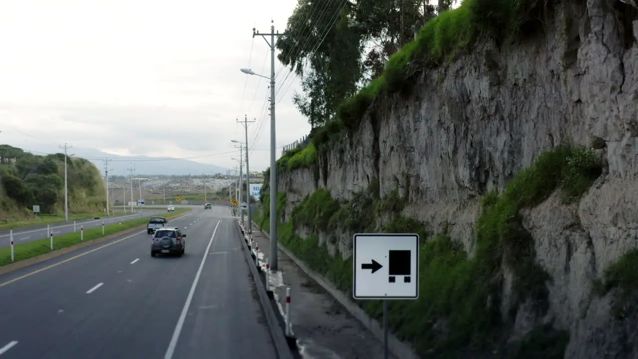 Road and natural landscape towards the city