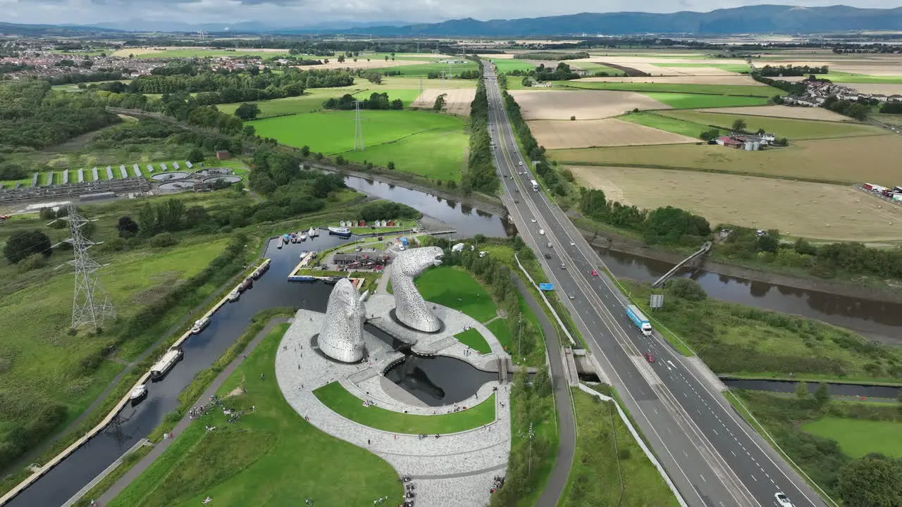 4K stationary aerial of The Kelpies the largest quine sculptures in the world