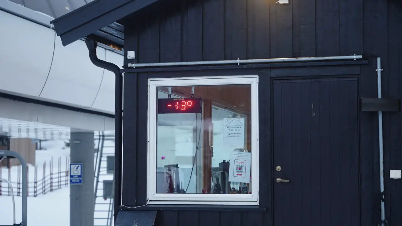 Sign at ski resort showing -13 degrees celcius temperature on a cold winter morning in Norway