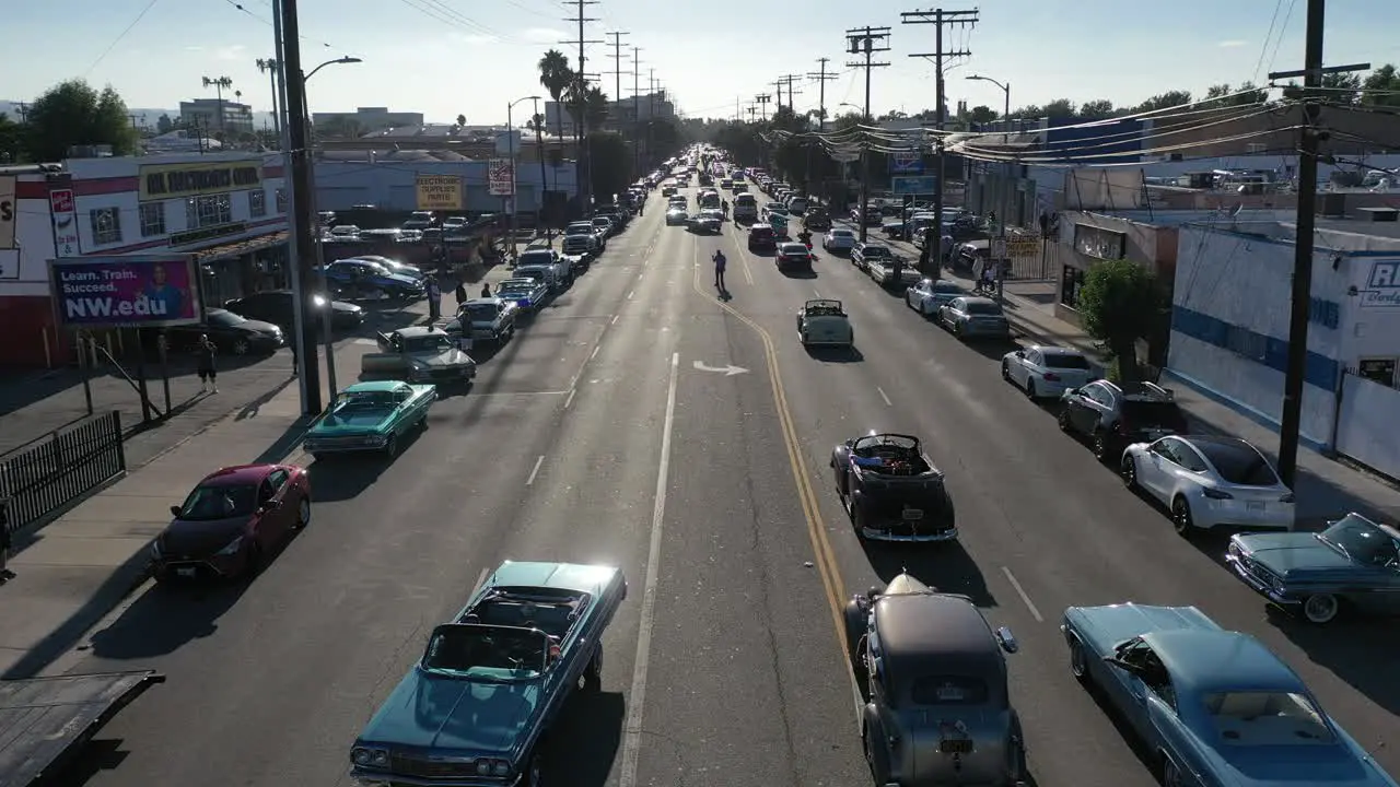 Low Riders doing stunts in Intersection