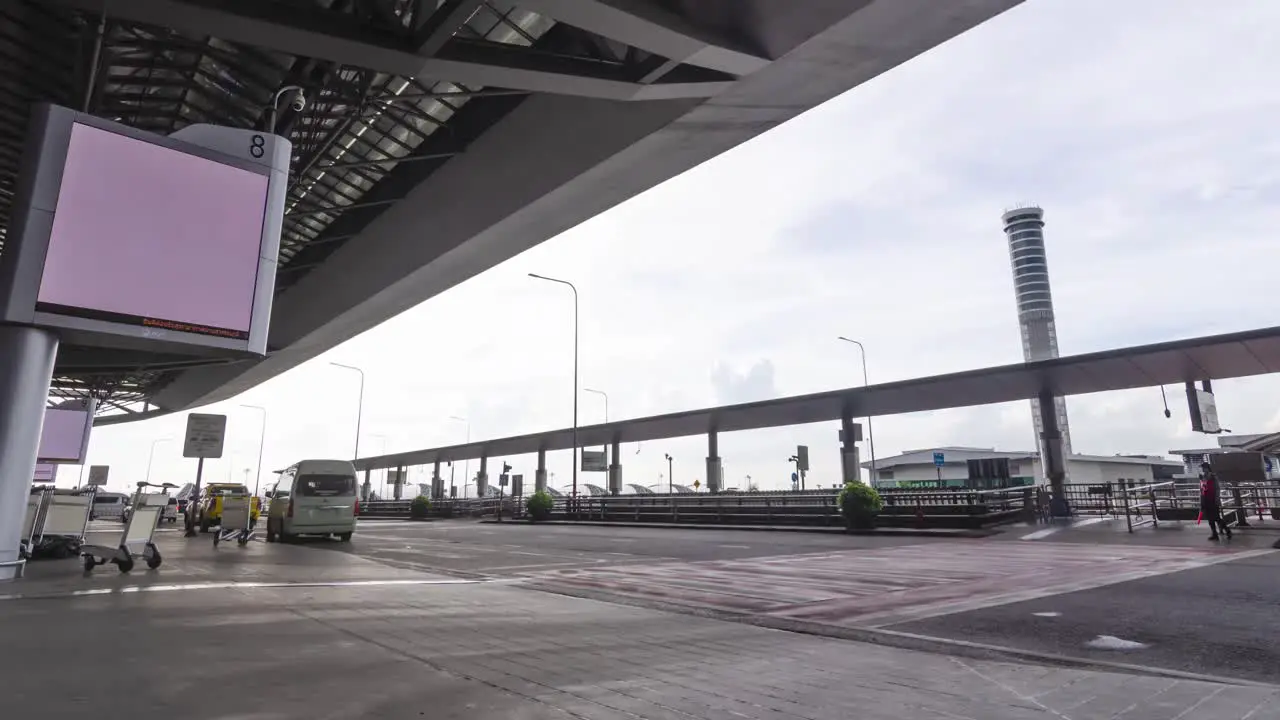 June 2 2022Bangkok Thailand timelapse view many car arriving to departure terminal with many passenger at suvarnabhumi airport thailand reopening country