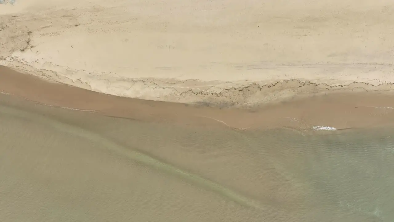 Direct Aerial over Muskegon Shoreline while rising up