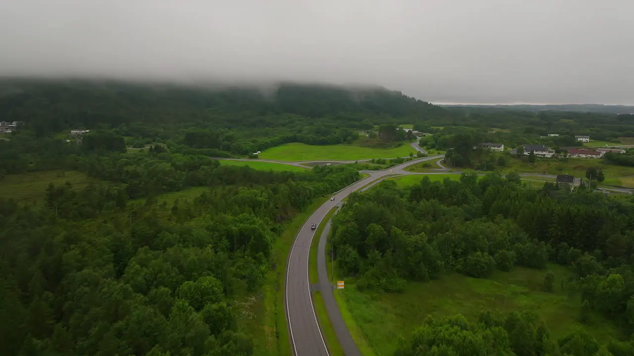 Gloomy Sky Over Coastal Highways Amidst Lush Forest On The West Coast Norway