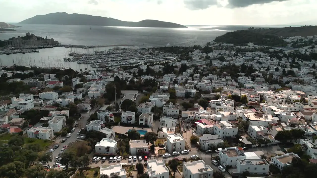 over view of Bodrum city a city with white houses by the sea side and big marina Turkey