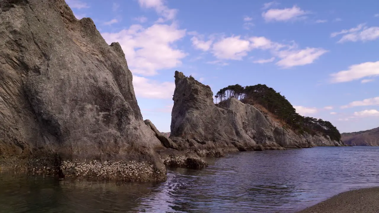 Calm and beautiful scenery of tall cliffs at Jodagahama beach in Japan