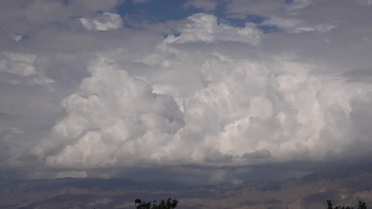 Huge Thunderclouds And Thunderheads Suggest An Approaching Storm