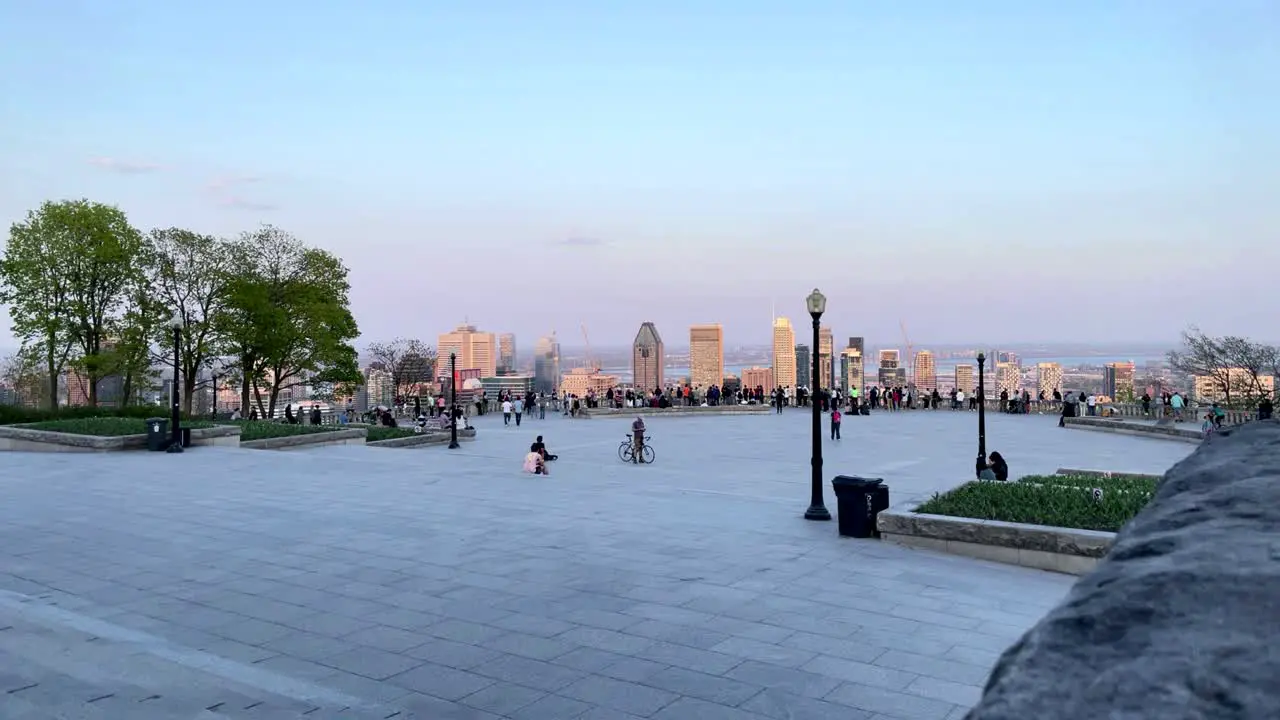 Evening Timelapse of the Kondiaronk Belvedere on Mont Royal in Montreal Quebec with the City Skyline in the Background