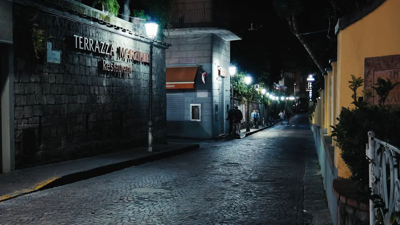 Cobblestone Street by Sorrento Restaurant Italy at night