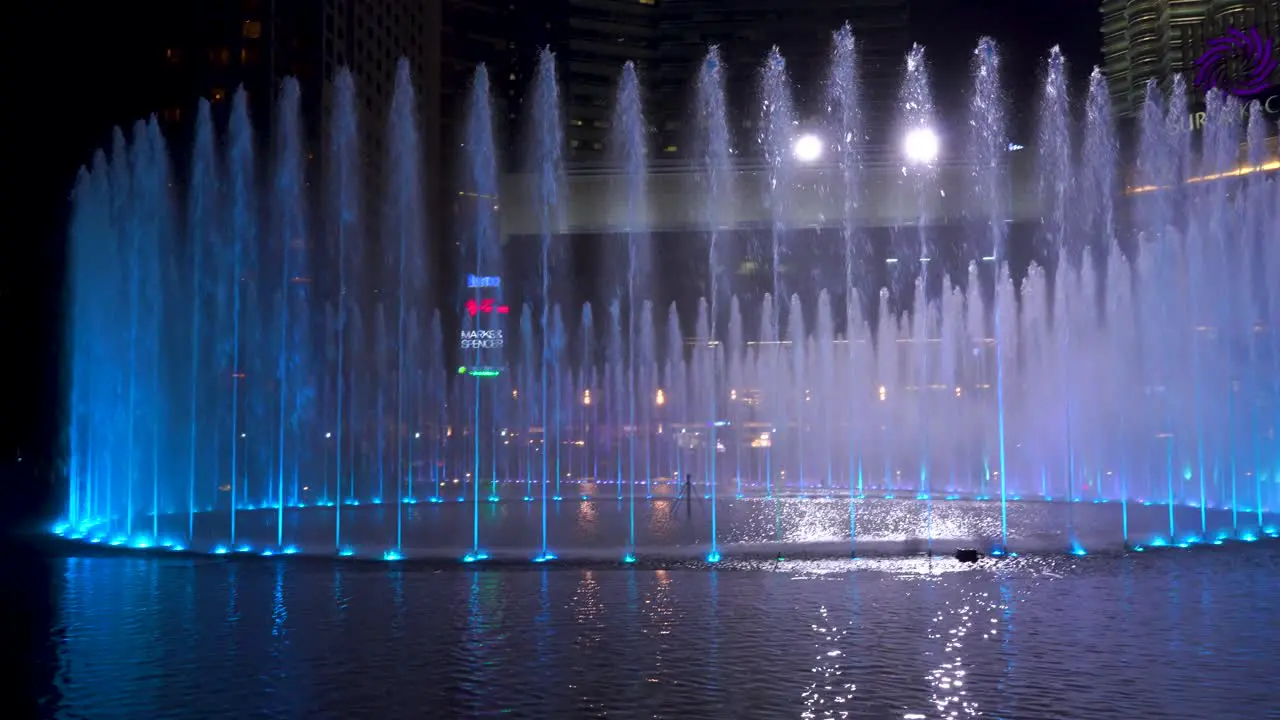 Quick establishing TV-like shot over Petronas Twin Towers in Kuala Lumpur