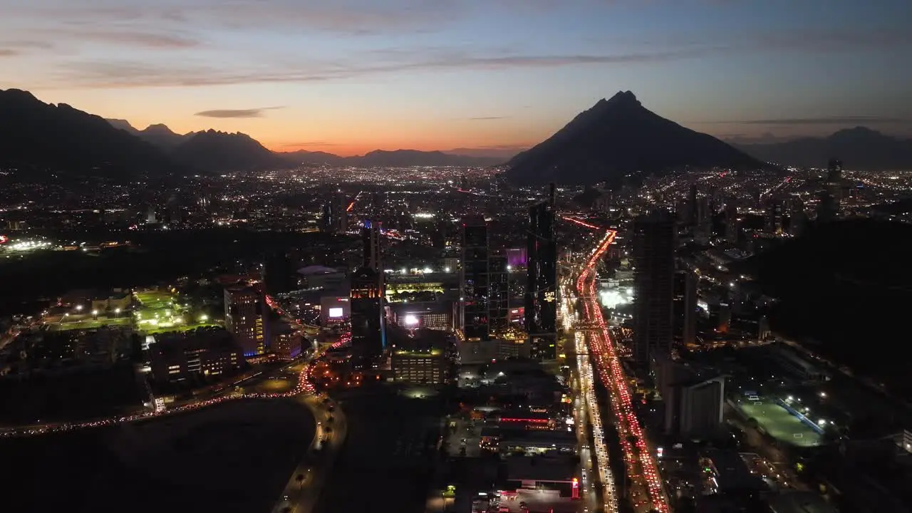 Night lit skyline of San Pedro Garza Garcia Monterrey dusk in Mexico Aerial view