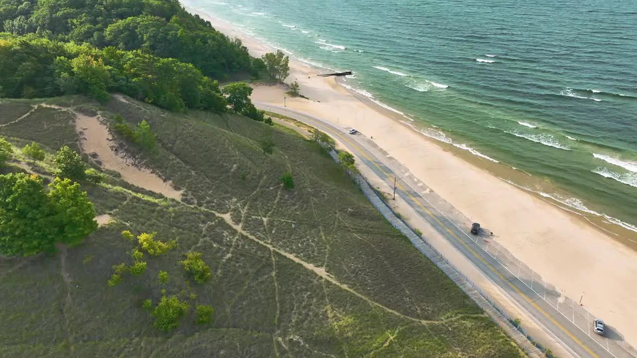 Fast tilt to show sand dunes and beach grass