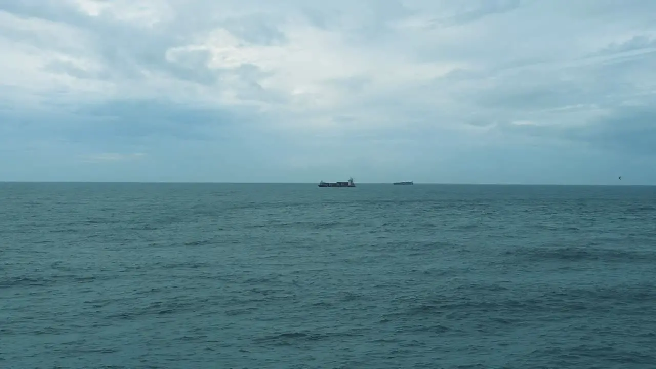 Aerial view container ship ocean drone flies over atlantic ocean transport ship open sea