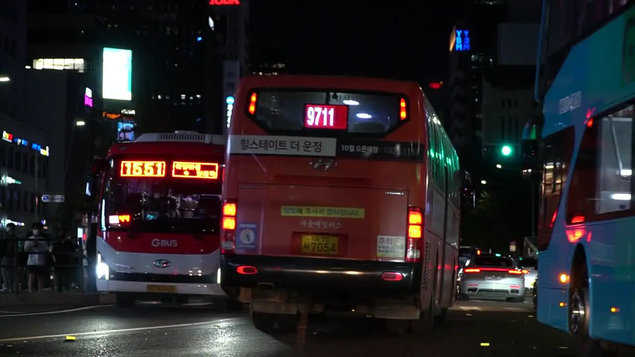 City Buses And Cars Driving On Busy Street In Gangnam-gu Seoul South Korea At Nighttime