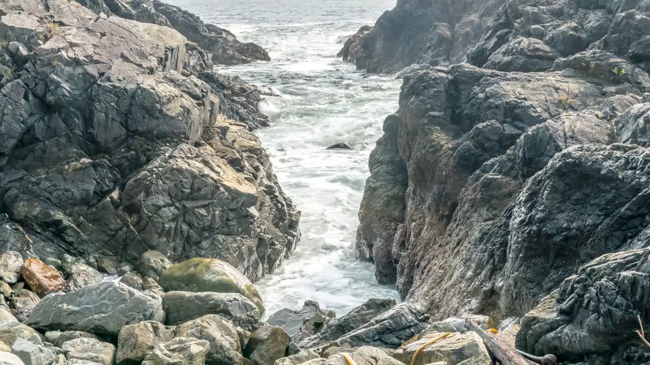 Timelapse of Waves Crashing through a Tunnel of Rocks in Ucluelet BC