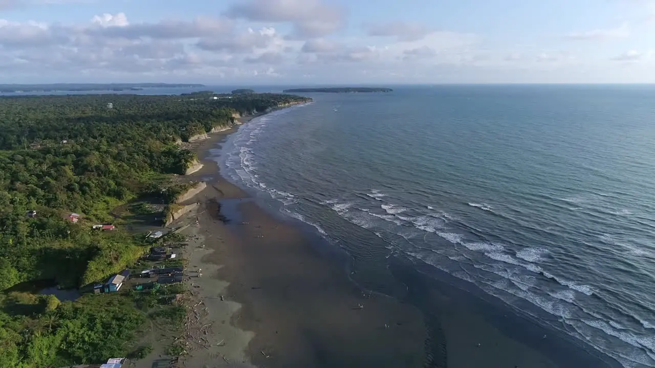 An aerial view of the waves crashing on La Barra beach a natural reserve in the Colombian Pacific