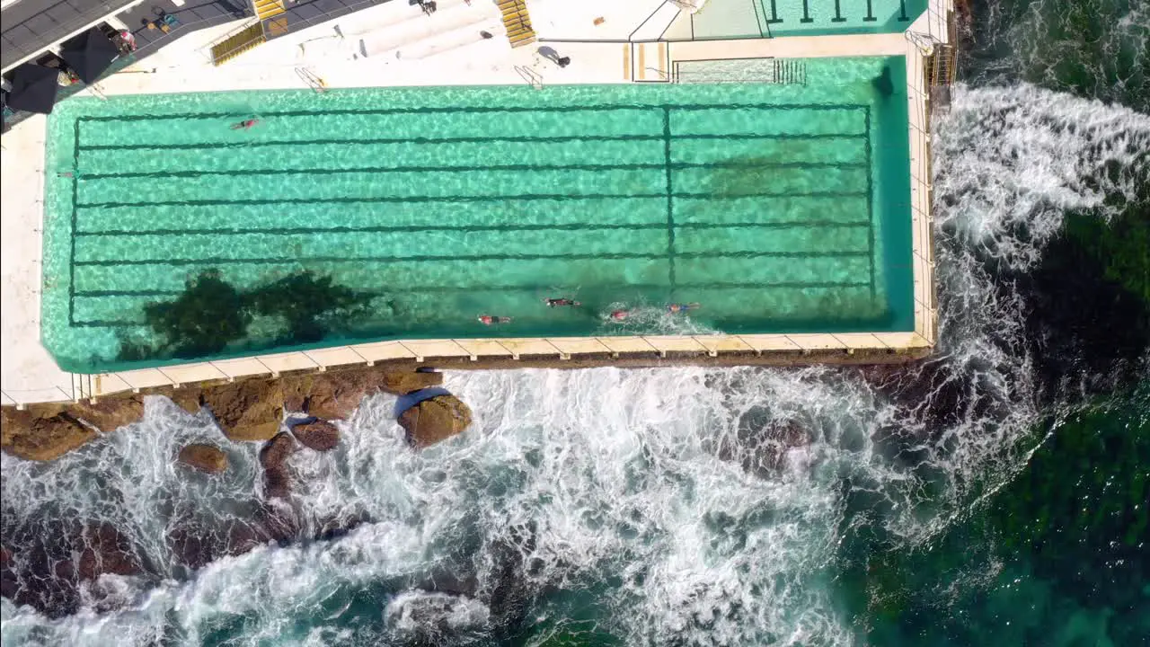 Bird's Eye View Of Bondi Icebergs Pool With Waves Crashing On Rocks At Bondi Icebergs Club New South Wales Australia