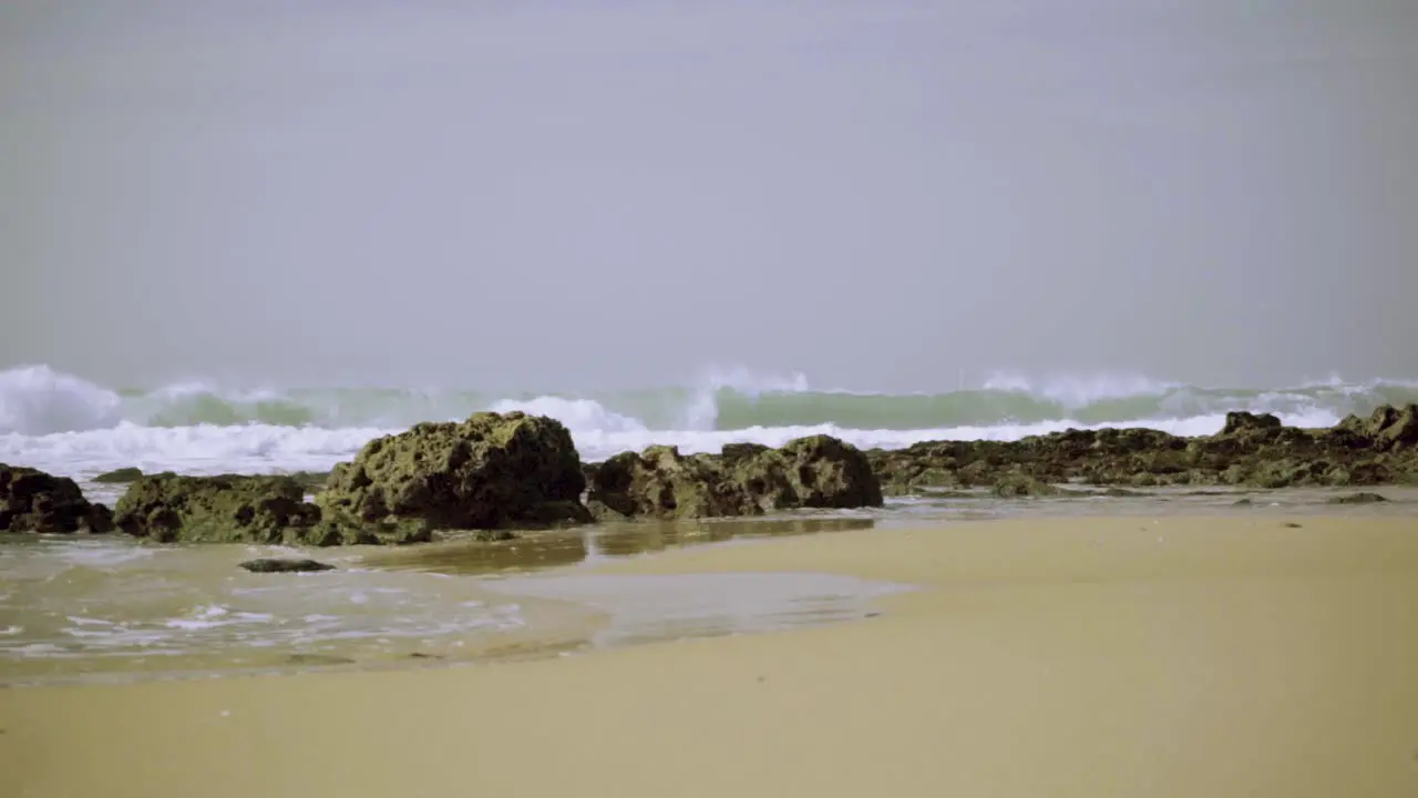 Nature Sea Ocean Shore Stones Rocks Waves Big Waves Waves Crash Sand Seaweed Wind Sunny Daylight Steady Shot Slow Motion