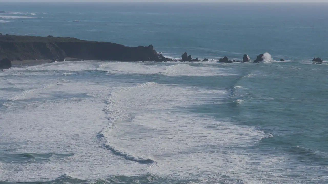 elevated view of waves rolling to shore in the Pacific Ocean located in Big Sur California