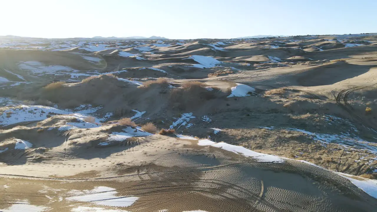 Scenic aerial views of sand dunes in Utah USA with snow patches in the winter