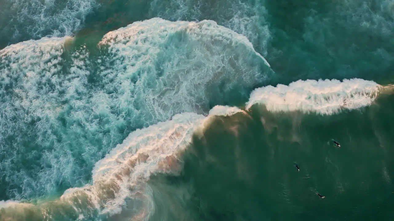 Bird's Eye View Of Surfers At Llandudno Beach Cape Town South Africa drone shot