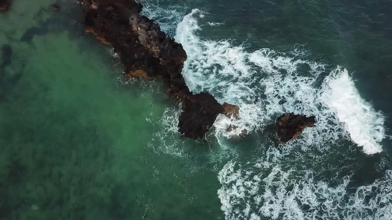 Relaxing view of sea calmly waving rock formation at Watamu Kenya