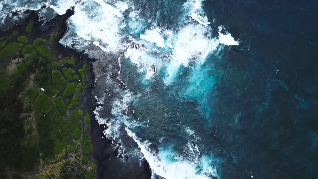 The Big Island of Hawai'i housing beautiful contrasts of black green and blue all shown from above-1