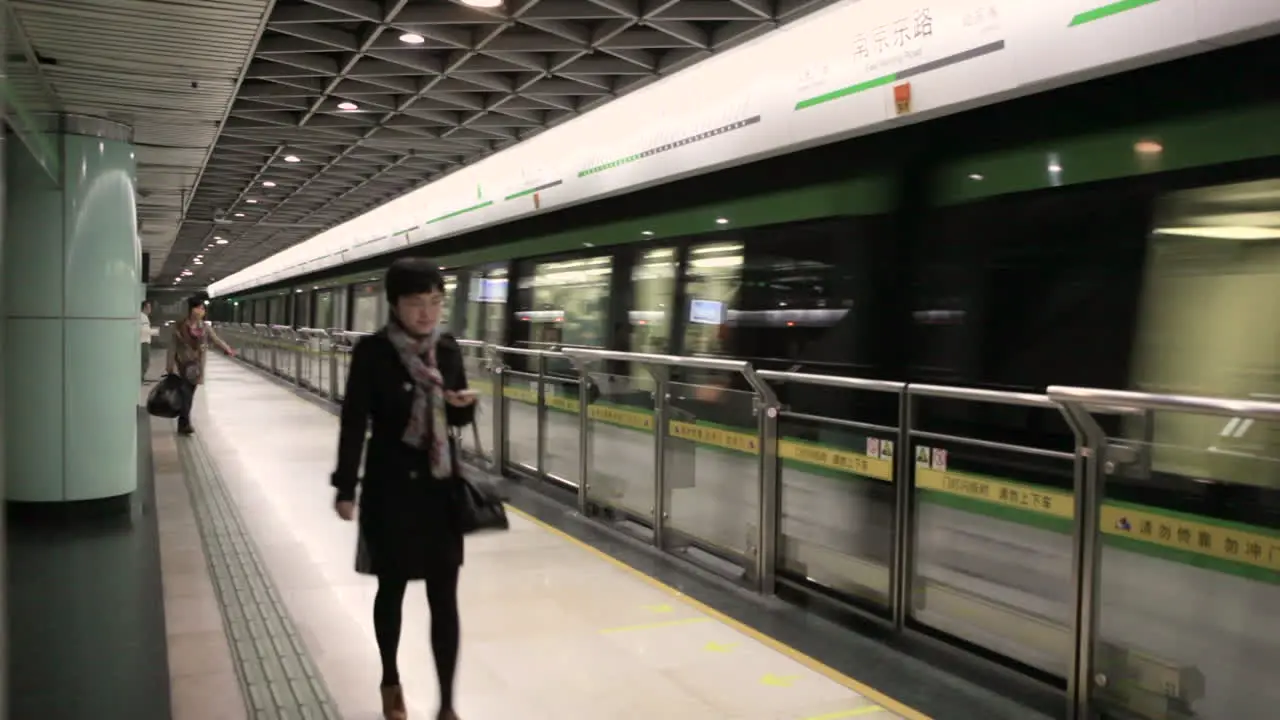 The Shanghai China subway moves through an underground station