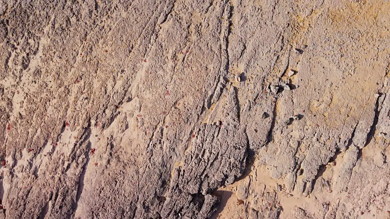 Bird's eye view of thin sheets of eroded rocks on dry Northside of Curacao