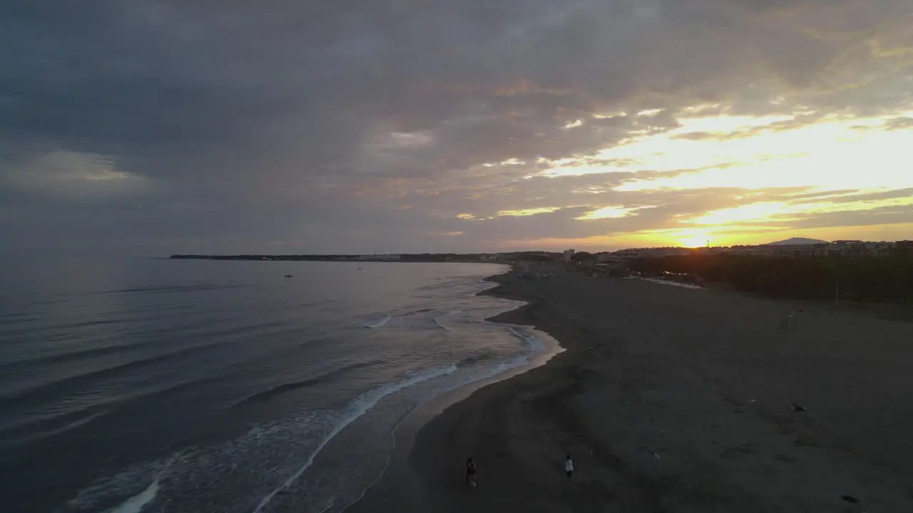 Zooming out to the beach of Albania at sunset makes the magic of evening Albania