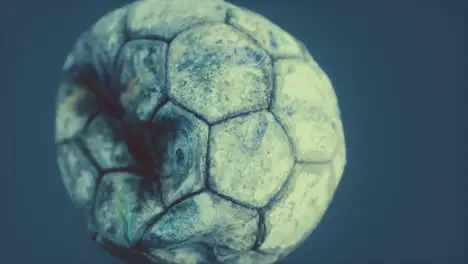 old deflated leather soccer ball