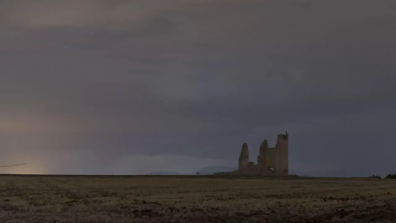 Ruins of castle against stormy sky