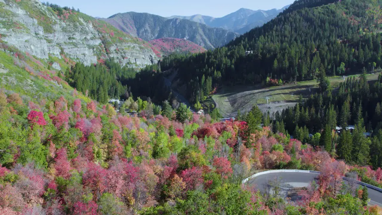 Trees in fall colors among the high mountains of Sundance Resort