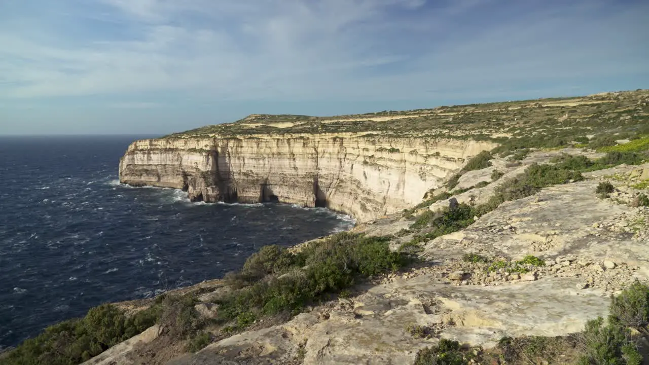 Panoramic View of Mediterranean Sea and Cliffs of Gozo Island on Windy Day