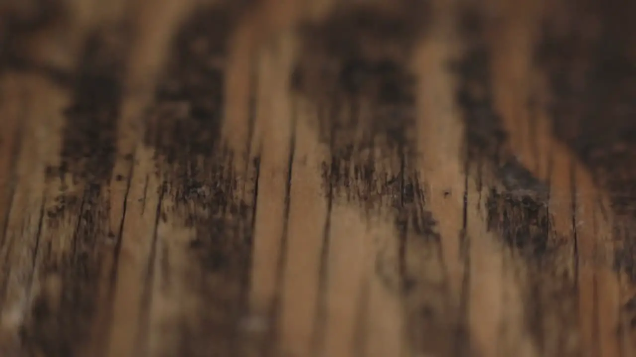 Vertical Lines And Several Grains On The Uneven Shaved Wood