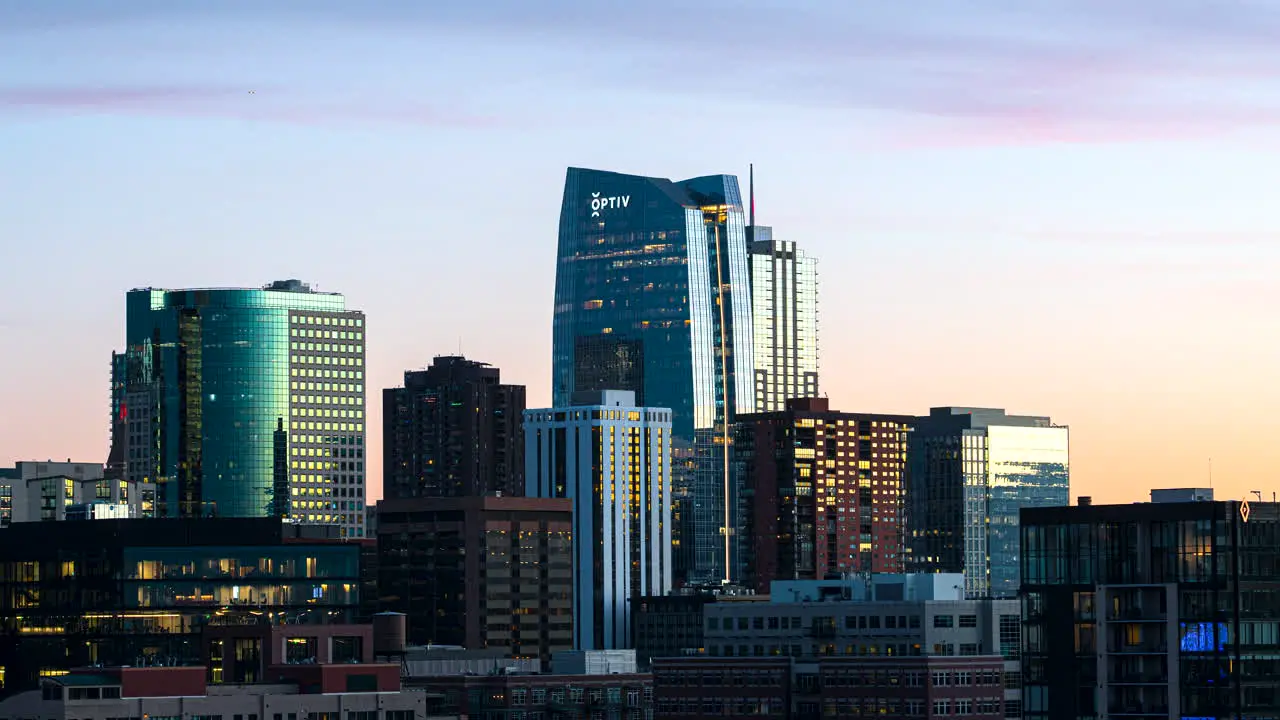 Day to night timelapse of the Optiv building Downtown Denver Colorado