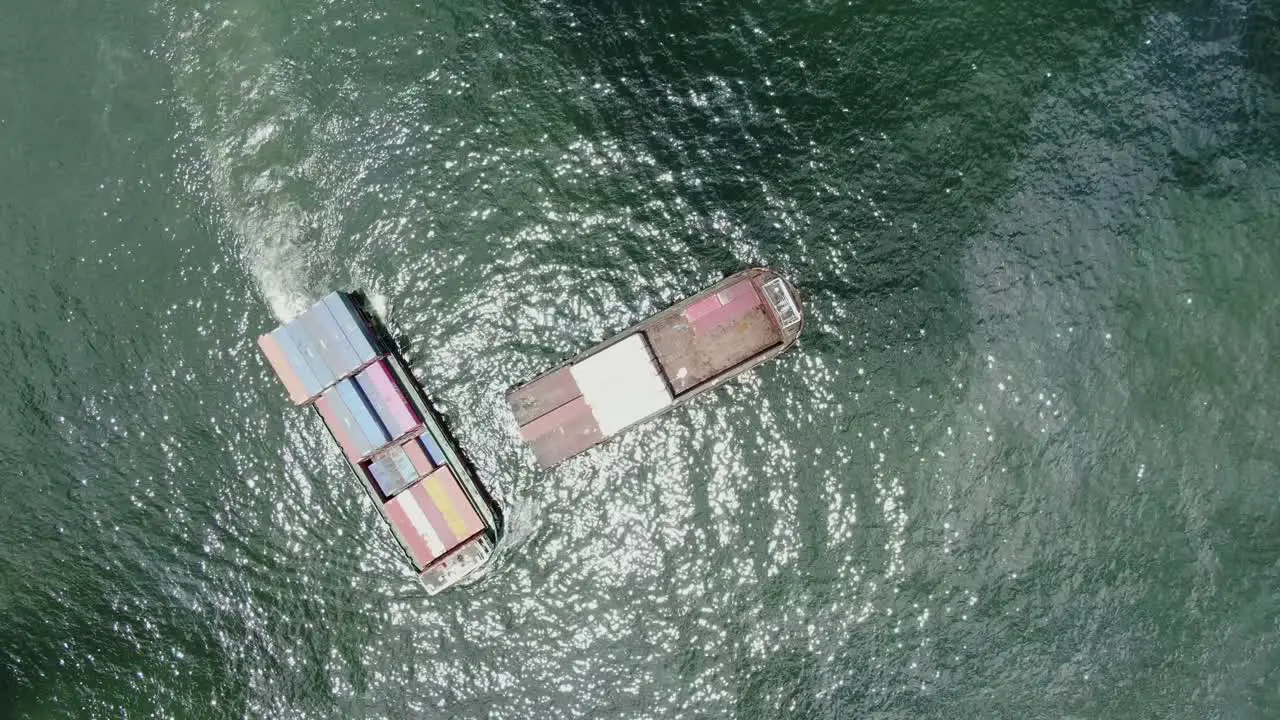 Small Feeder class Container ship in Hong Kong bay Aerial view