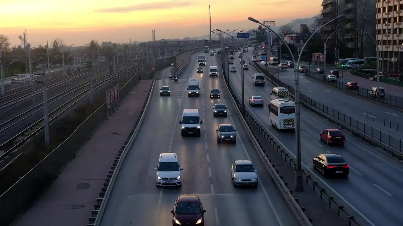 Vehicles Moving On Highway In Reddish Air