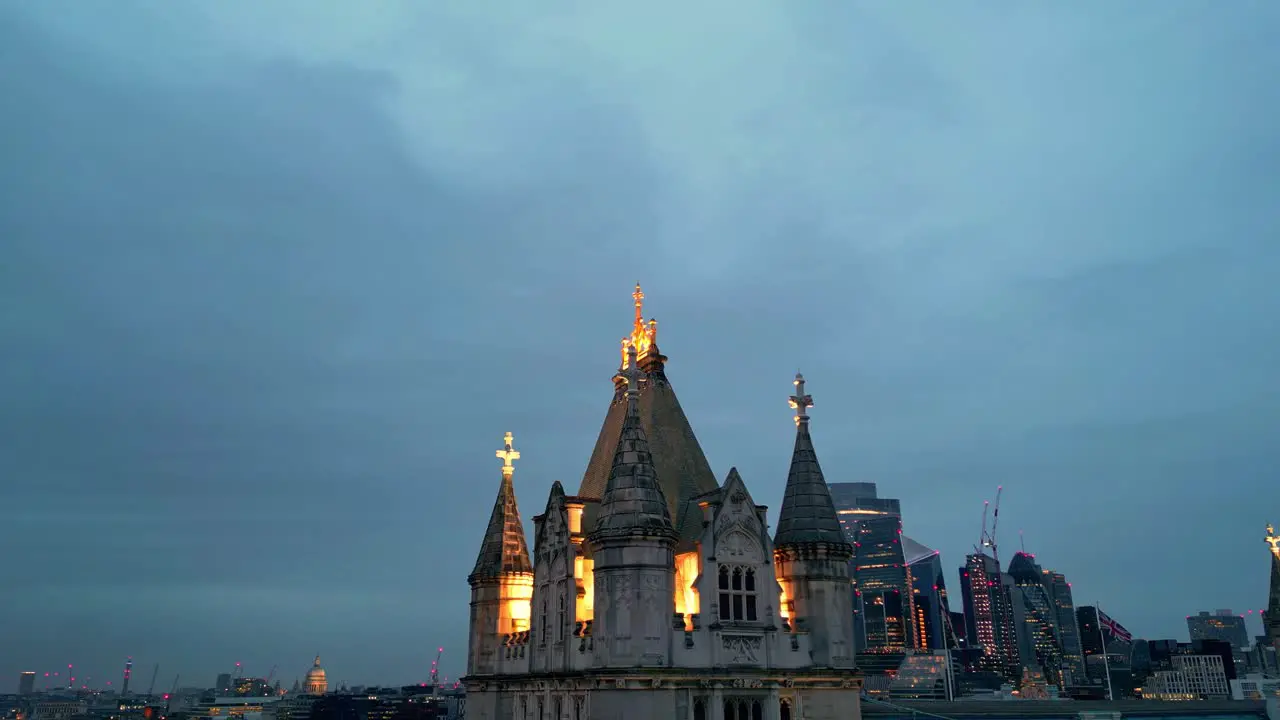 Dolly in pedestal up drone shot of the highest part of the Tower Bridge in London