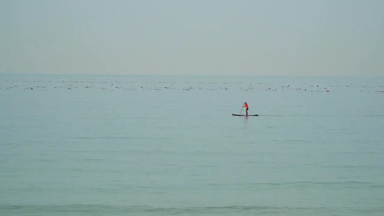 Tourist Standing On The Small Boat Rows In Seongjong Beach In Busan South Korea