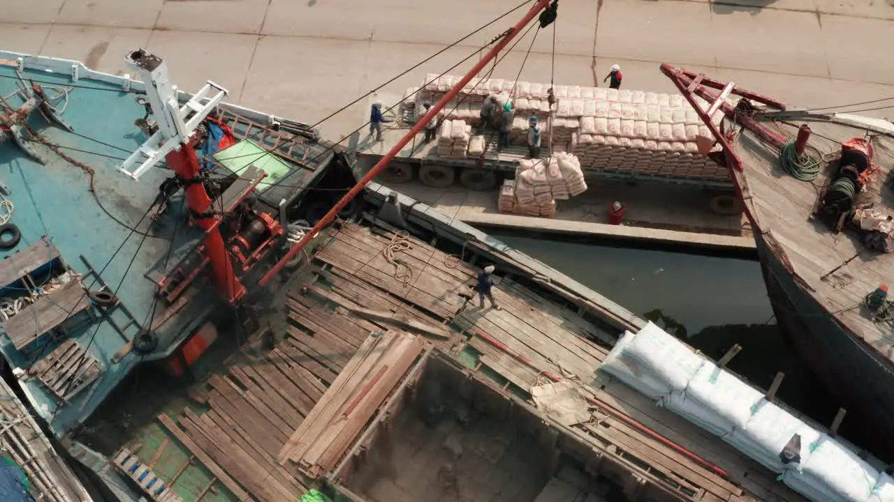 Rotating Drone Shot of Loading Boats in Jakarta